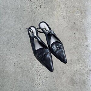 Black leather kitten heels